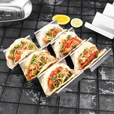 Los tenedores de acero inoxidables del taco de la astilla abultan las fuentes de la cocina