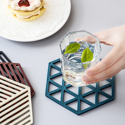 Herramienta multifuncional de la cocina del calor del hexágono de las esteras de la trébede del silicón y de los cojines calientes para las esteras del cuenco