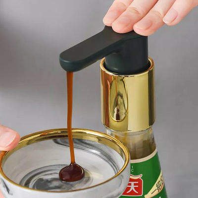 Bomba hermética del dispensador de la salsa de la ostra de la botella de la prensa de la mano del apretón de las herramientas de la cocina