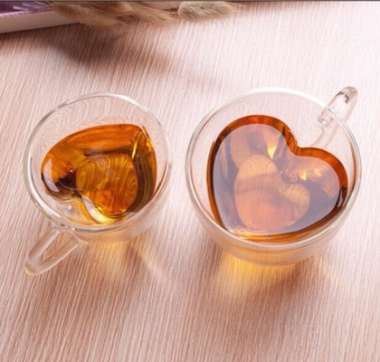 Regalo de cristal transparente 200ml-300ml en forma de corazón de las tazas de consumición de la aduana ISO9001