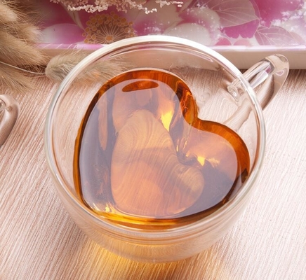 Regalo de cristal transparente 200ml-300ml en forma de corazón de las tazas de consumición de la aduana ISO9001