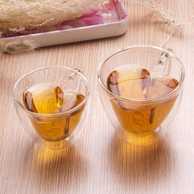 Regalo de cristal transparente 200ml-300ml en forma de corazón de las tazas de consumición de la aduana ISO9001