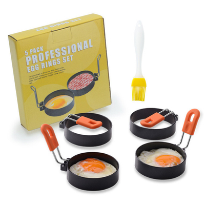 Anti escalde los electrodomésticos de acero inoxidables 2.95Inch Fried Egg Ring Mold 4 paquetes con el cepillo del aceite