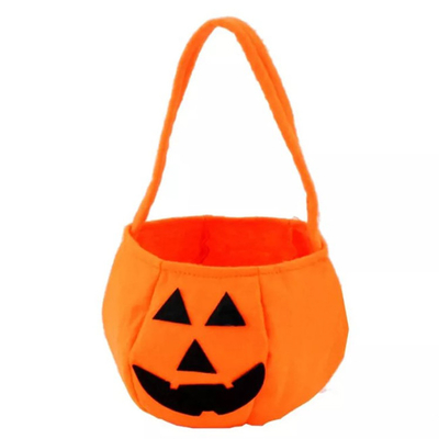 La Navidad no tejida de Halloween adorna truco o la invitación del cubo del caramelo de la calabaza