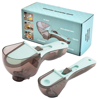 Tazas y cucharas ajustables de medición plásticas que miden la cucharilla de la cuchara de sopa