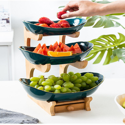 2 verdes blancos cuenco de fruta de cerámica de 3 gradas con el soporte de madera de bambú para la encimera